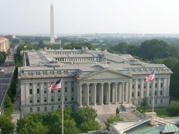U.S. Treasury Building in Washington with the Washington Monument behind