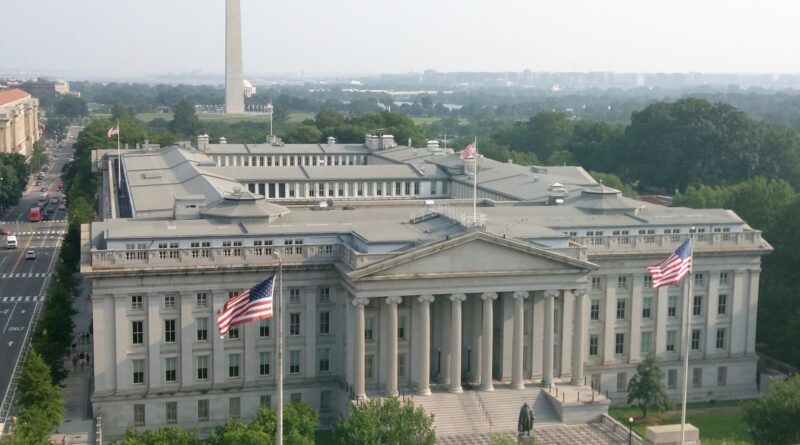 U.S. Treasury Building in Washington with the Washington Monument behind